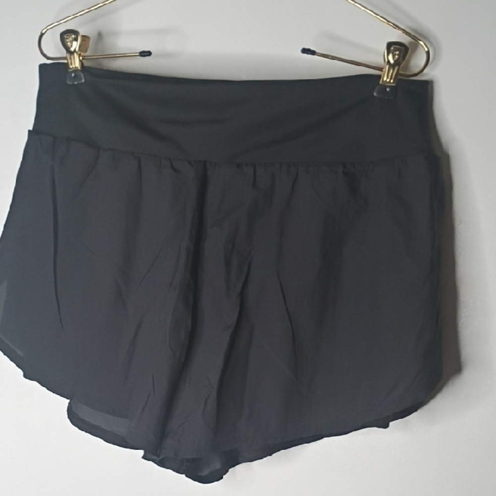 Mixed Stack of Folded Pants and Jeans - White, Purple, Light Blue, Black - Picture 12 of 14